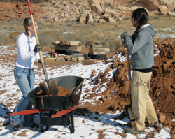 Girls and wheelbarrow